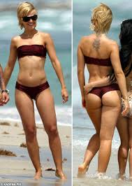 Day two and Mena Suvari slips