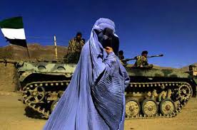 Click on the Afghan woman in a burqa