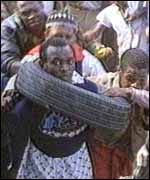 [ image: A necklacing victim]