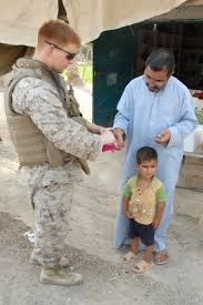 Marine  Man   and  Boy   Ramadi jpg
