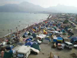 File:Nudist beach in