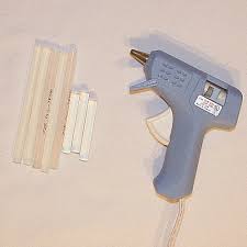A hot glue gun which should be - via Daymix