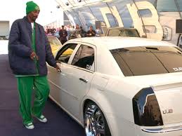 Snoop Dogg and two members of - via Daymix