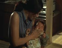 「子供の口にご飯を詰める」だ