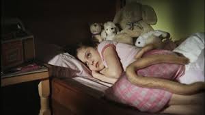 Girl threatened by tentacle of