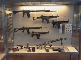 At top is the SIG 57 assault  rifle  