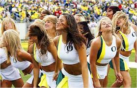 College Football Cheerleaders - via Daymix