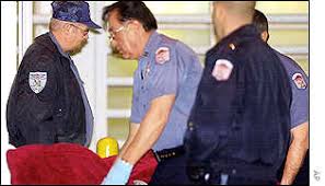 Officers remove Wanda Jean Allens 