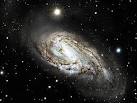 APOD: 2004 April 7 - Unusual Spiral Galaxy M66