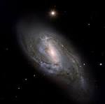APOD: 2006 September 2 - Dusty Spiral M66