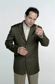 Image Monk (<b>Tony Shalhoub</b>) takes Picture
