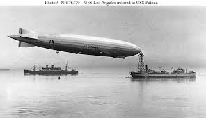 dirigible at sea - via Daymix