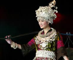      in a Chinese  Ethnic Costume      