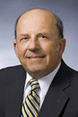 Frank J. DeMarco assists the