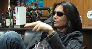 frontman Tomonobu Itagaki