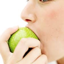 Student eating apple