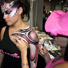 Painting Halloween Makeup - via Daymix
