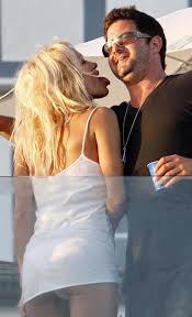   Pamela Anderson   with the lizard    
