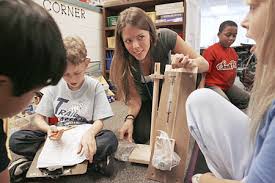 a third-grade teacher at - via Daymix
