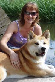   akita training   on beach