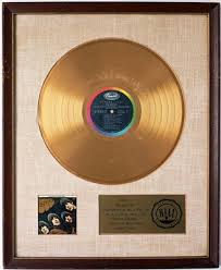 memorabilia gold album of - via Daymix