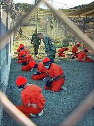 Detainees at - via Daymix