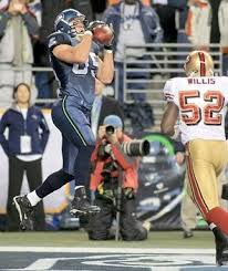 Will Heller (85) hauls in a