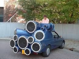 Car filled with speakers.