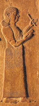 A scribe  writing cuneiform  