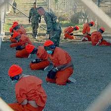 Detainees at Camp X-Ray - via Daymix