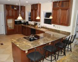 A kitchen with granite counter