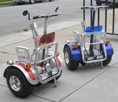 Blue and Red Segways - via Daymix
