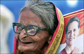 A woman at an election rally for ...