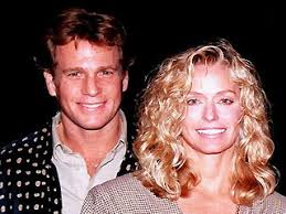 Farrah Fawcett and Ryan O'Neal - via Daymix