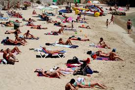 File:Topless beach