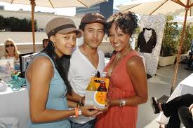Tia, Tahj, and Tamera Mowry attend 