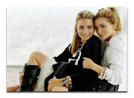 Kissing sisters  Mary    Kate   and  Ashley      