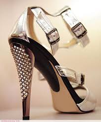 Jimmy Choo - via Daymix