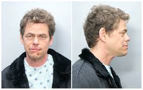 His mugshot. Image - via Daymix