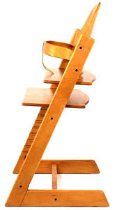 Wooden high chairs. - via Daymix
