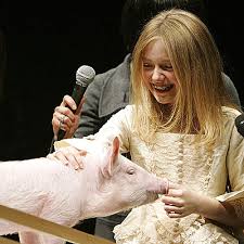 Image <b>Dakota Fanning</b> shows off her animal <b>...</b> Picture
