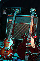 Gentleman guitar, models played by McCartney and Harrison, respectively. The small Vox amplifier behind them is the kind The Beatles used in concert.