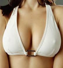 揩擦乳房。