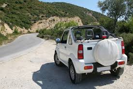 Grenada, David's Car Rental - via Daymix