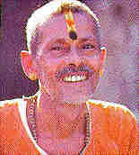The  Tilaka   is normally a vermilion    