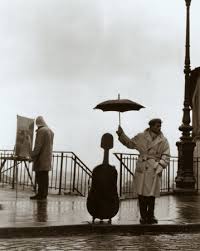 Musician in the Rain Prints by - via Daymix