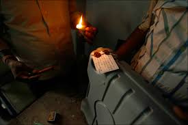 Election officers seal electronic ...