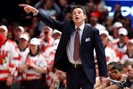 Louisville coach Rick Pitino's - via Daymix