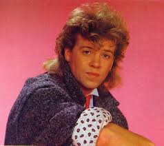 Perpetual 80's fashion victim - via Daymix
