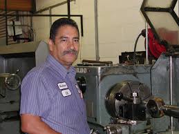 Asst. Manager, Eddie Romero